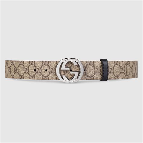 Gucci Cintura reversibile in pelle e tessuto GG supreme 